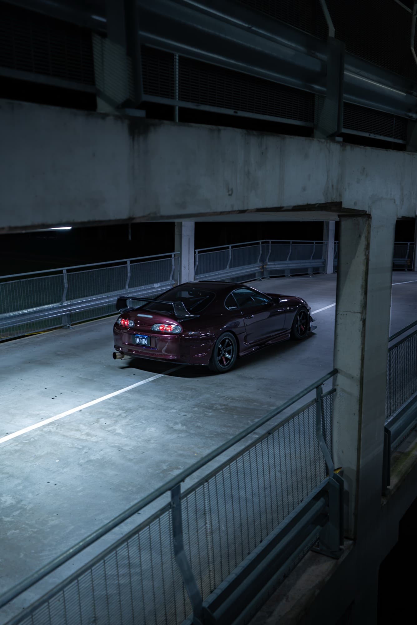 Toyota Supra — multi-storey car park at night